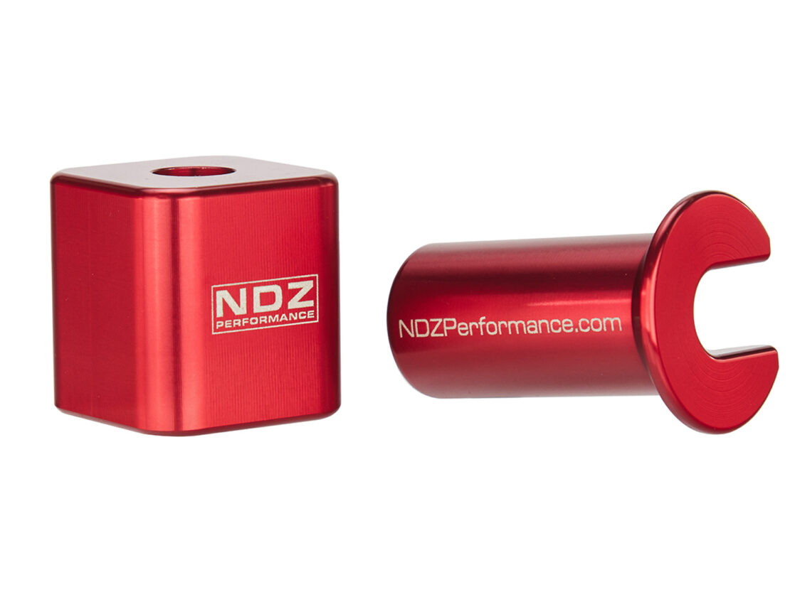 Red NDZ Performance Guide Rod Tool for Springfield Echelon, disassembled into two separate components.