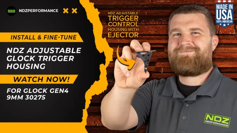 NDZ Performance team member holding an NDZ adjustable Glock trigger housing with ejector. Text reads "Install & Fine-Tune NDZ Adjustable Glock Trigger Housing – Watch Now! For Glock Gen4 9mm 30275." Includes NDZ branding, Made in USA badge, and a wood-textured background.