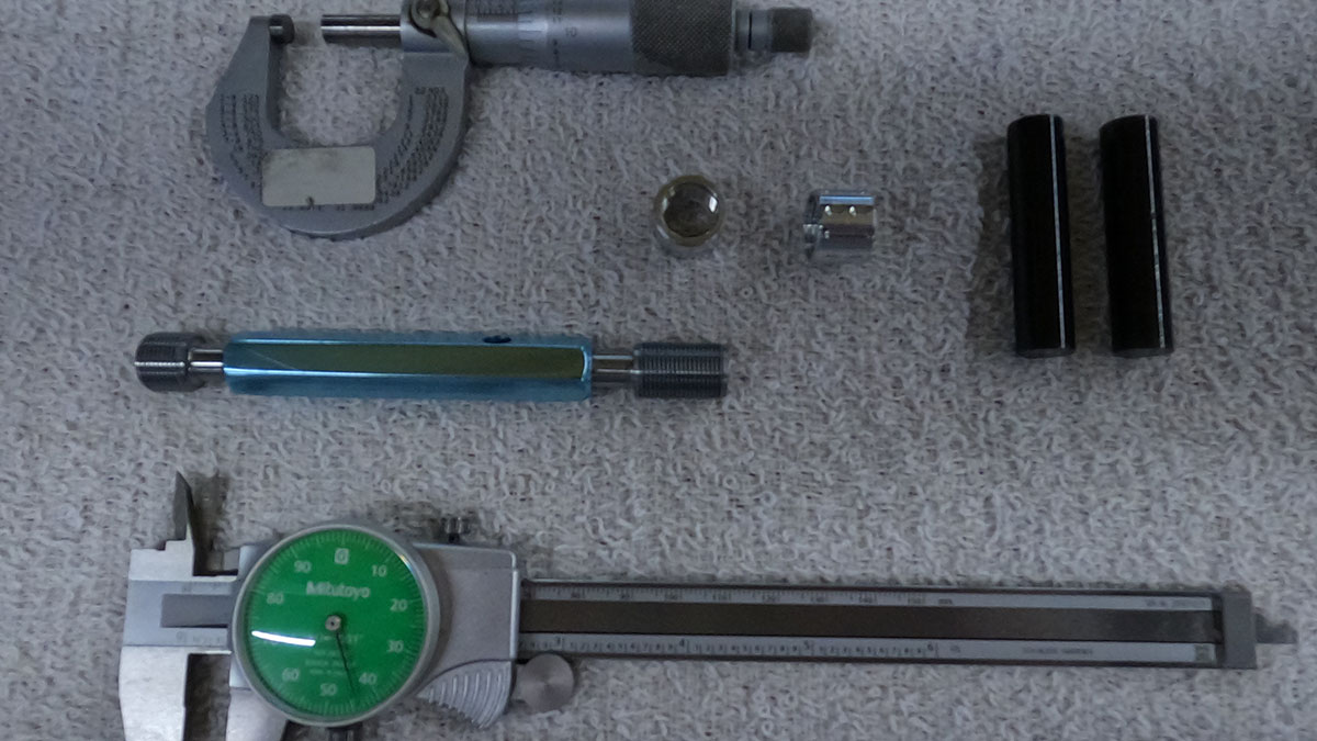 Calipers, micrometers and gauge pins used to measure NDZ parts
