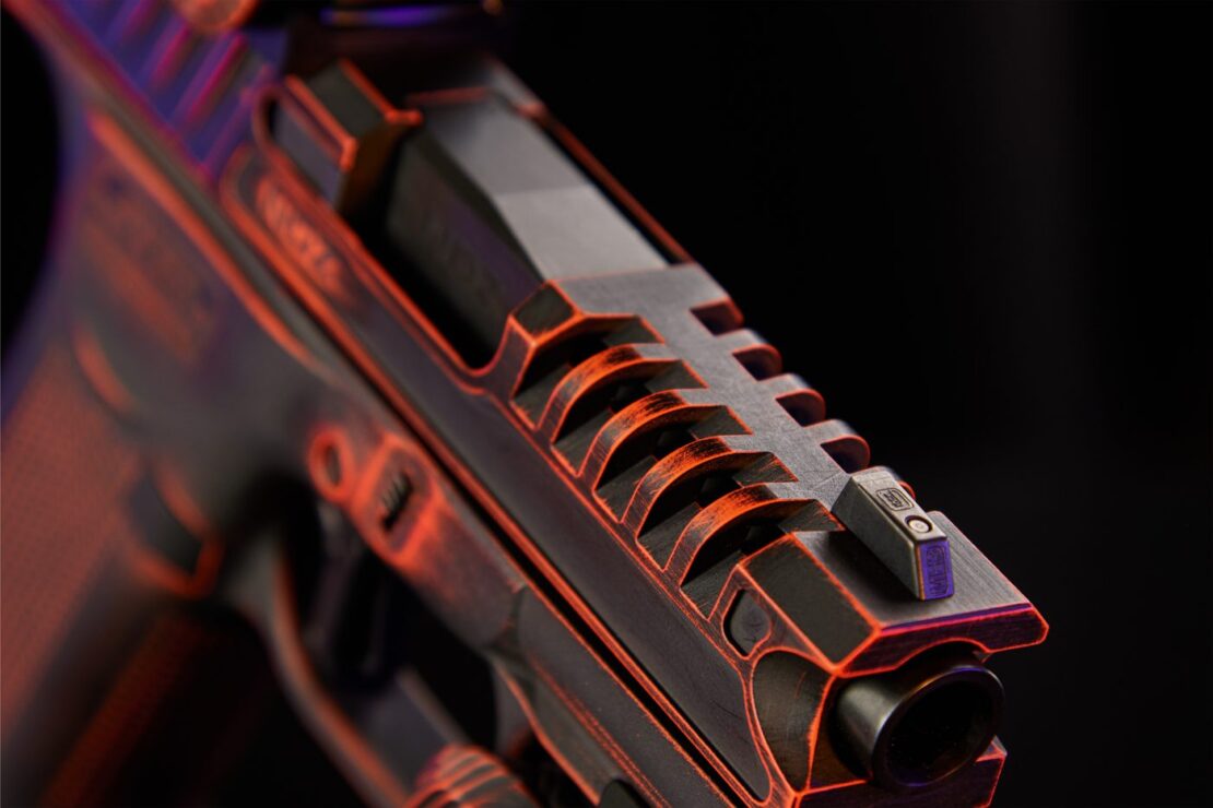 Close-up of the A.R.E.S. slide's lightening windows and front serrations.